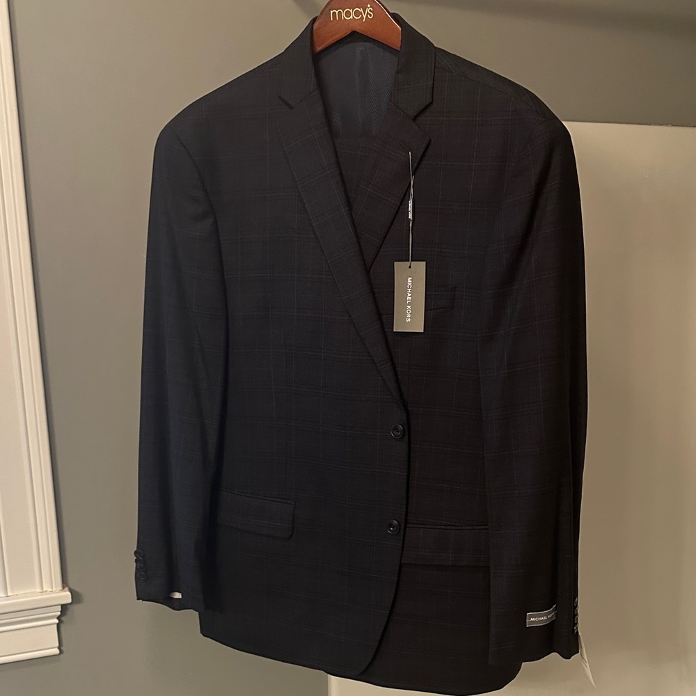 Calvin Klein plaid two piece Suit with tags brand new. Size 48R pants size 42w